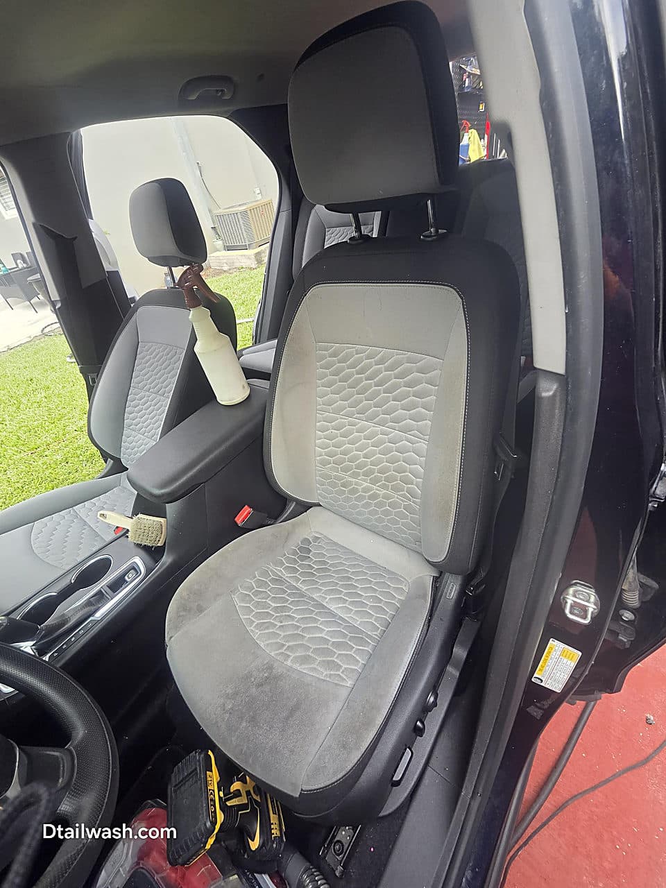 Dirty front car seat before interior cleaning